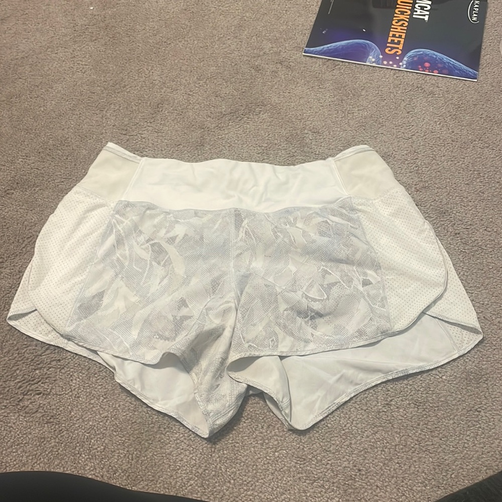 Lululemon size 12 runner short. 4” inseam with flowy sides with opening